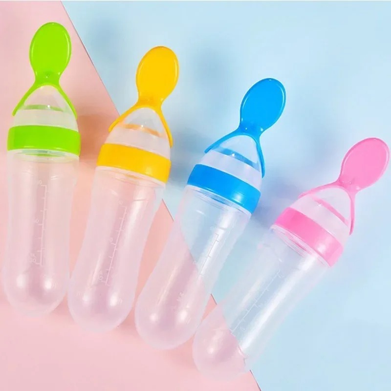Silicone Baby Spoon Squeezing Feeding Bottle Feeder – Soft, Safe & Easy Baby Food Dispenser (Random color)